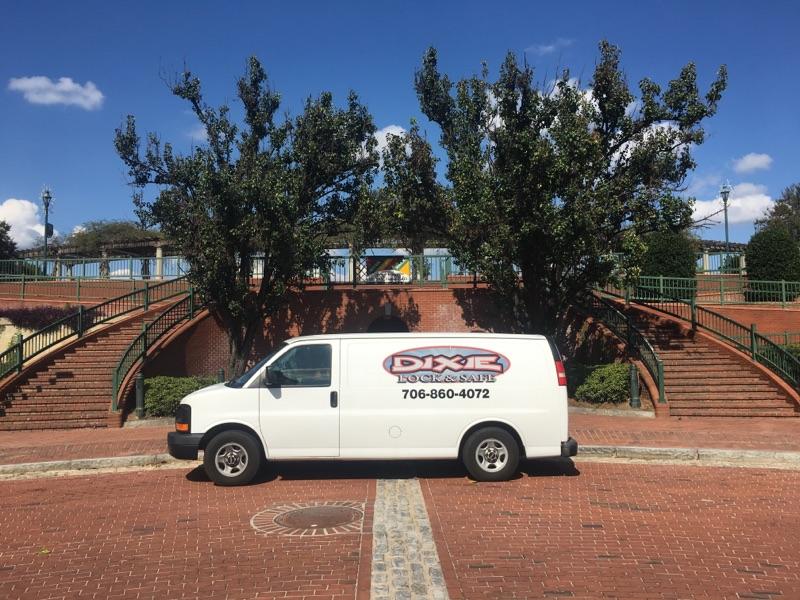 Emergency Locksmith Van in front of trees on driveway with stairs on both sides